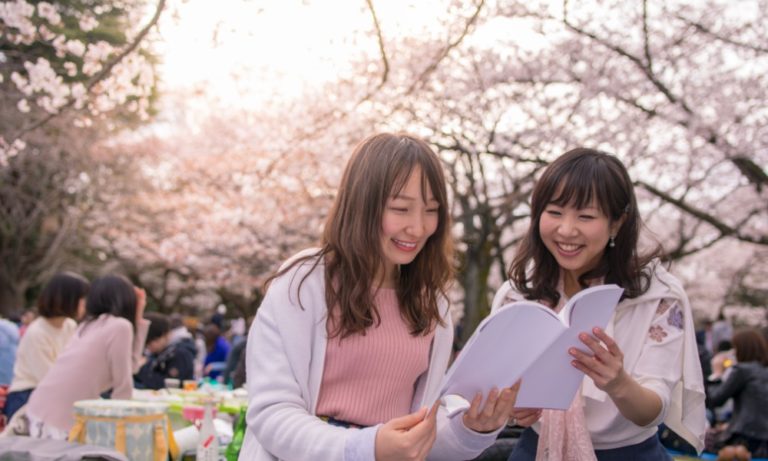girls doing cherry blossom viewing