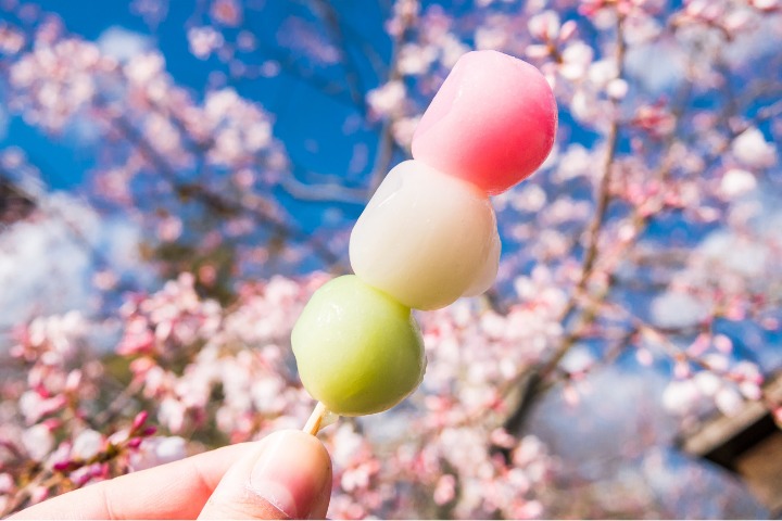 A hanami dango with three colors pink white and green