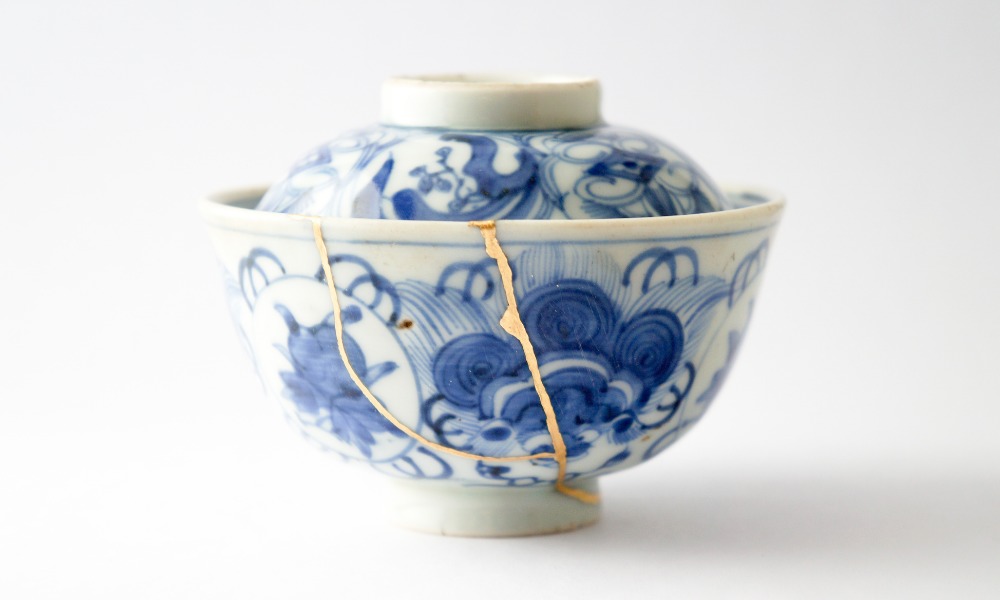 blue bowl made using the art of kintsugi