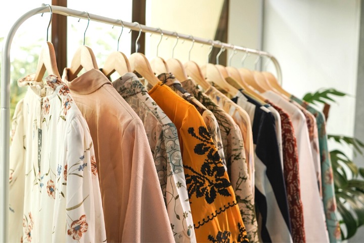 a photo of a rack of clothes
