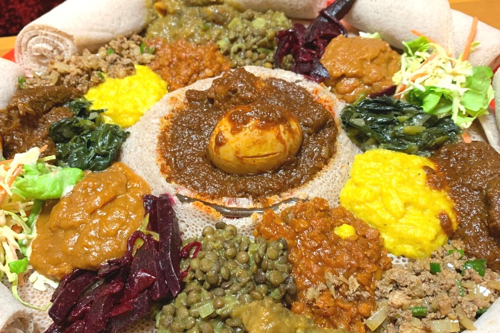 a photo of an Ethiopian food platter at an international restaurant in Tokyo