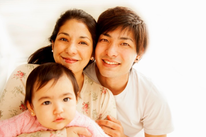 a photo of a mixed south asian and japanese family