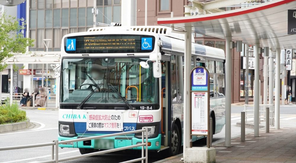 an image of a bus in japan at the bus stop