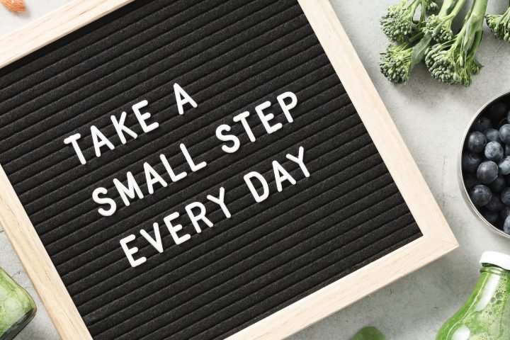 Mental health board with sentence that says take a small step every day